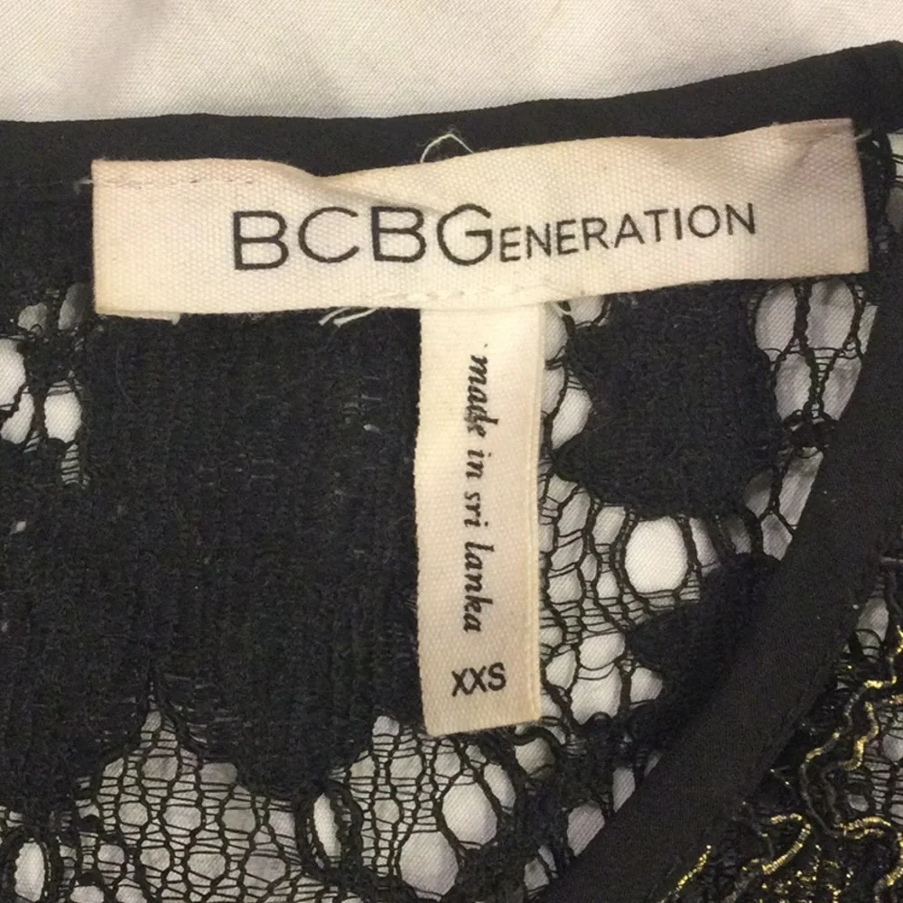 BCBGeneration Black and Gold Sheer Floral Lace Top Size XXS New Without Tags - Picture 7 of 8